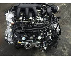 Complete and slim motor vehicle engine